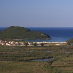 Ammoudia: The bay, seen across the marshy hinterland