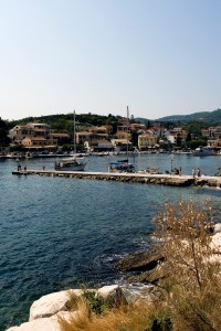 Kassiopi: The west breakwater with harbour and town behind