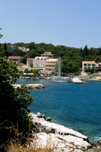 Kassiopi: The harbour entrance with yachts on the west quay