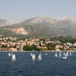 Herceg: Dinghies sailing in front of the town