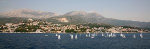 Herceg: Dinghies sailing in front of the town