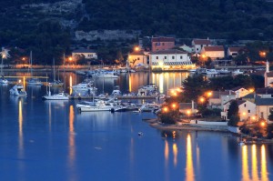 Ilovik Town: The harbour with yachts on the quays and on mooring buoys