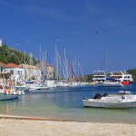 Kioni: The harbour looking out to sea with yachts on the east quay and ferries on the jetty