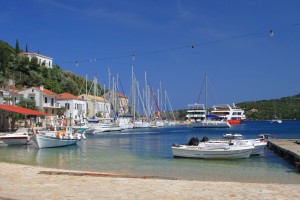 Kioni: The harbour looking out to sea with yachts on the east quay and ferries on the jetty