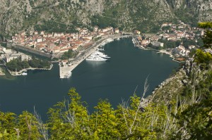 Kotor: Aerial view of the bay showing the town, port and extensive fortress walls
