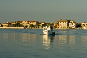 Krapanj: A boat leaving the harbour on the SE corner of the island