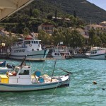 Vasiliki: Trip boats and fishing vessels in a corner of the harbour