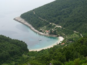 Orlandusa: The bay and beach with a yacht at anchor