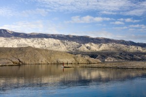 Misnjak: Dramatic scenery but less good as an anchorage now it's ferry port