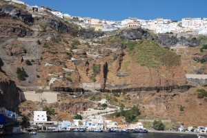 Skala Thira: The quay at the base of the cable car and steps with Fira town above