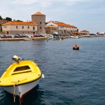 Senj: Small boats in front of the Customs and Harbour Master's offices.