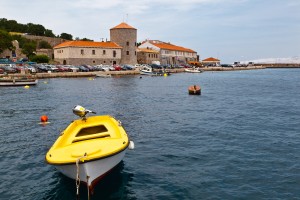 Senj: Small boats in front of the Customs and Harbour Master's offices.