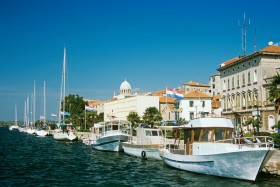 Sibenik: The yacht quay with the dome of the cathedral visible behind Sibenik: The yacht quay with the dome of the cathedral visible behind