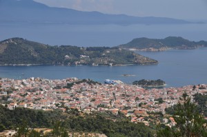Skiathos: Approach to the harbour. The ferry is on the south quay. The yacht quays are behind teh houses left