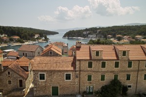 Vrboska: View seaward over the houses, showing the channel with the yacht quay right