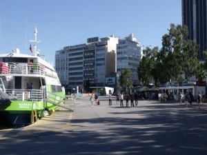 Piraeus, Athens: Poros ferry tickets are sold at the booth, right, at the window nearest the camera.
